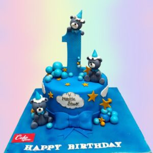 A Amazing Blue Teddy Boys First Birthday Cake 2 kg, Featuring a cute blue teddy bear and charming decorations, perfect for celebrating a baby boy’s first birthday.