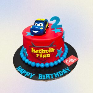 A Amazing Car Theme 2nd Birthday cake 1 kg, Featuring a dynamic car design and bright colors, ideal for celebrating a second birthday with a fun and energetic theme.