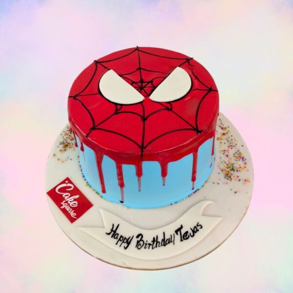 A Amazing Spiderman Kids Birthday Cake 1 kg, Featuring Spiderman’s iconic web design and mask, perfect for a young superhero’s birthday celebration.