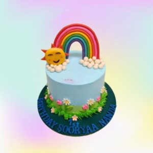 Vibrant Amazing Sunshine Rainbow Birthday Cake 1 Kg with colorful rainbow layers, fluffy clouds, and a beaming sun topper