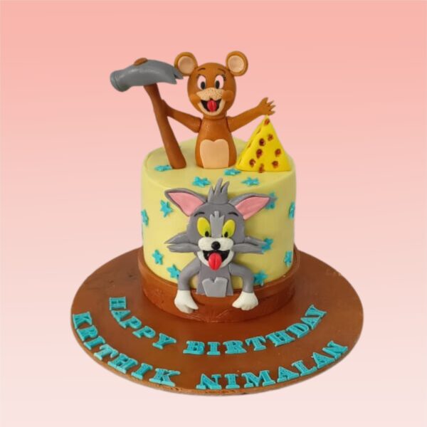 A Amazing Tom And Jerry Theme Boys Birthday Cake 1kg, Featuring playful designs of Tom and Jerry, perfect for a fun and nostalgic birthday celebration.