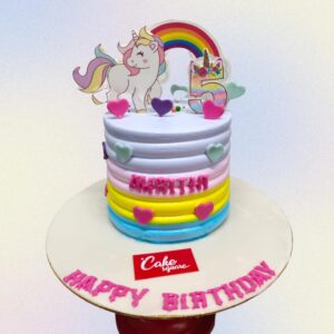 Amazing Unicorn Theme Birthday Cake 2 Kg Two-tier white and pastel cake with fondant unicorn topper, rainbow mane, and gold accents