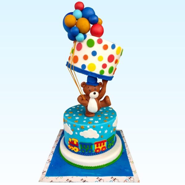 Anti-Gravity Bear Theme First Birthday Cake 5 Kg, a unique cake with a playful design.