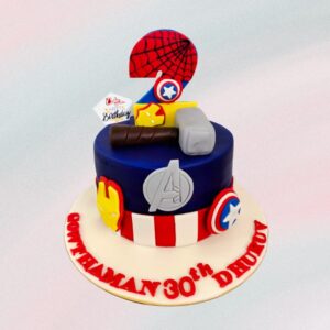 A dynamic 1 kg Avengers themed boys birthday cake, featuring iconic superheroes in a vibrant, action-packed design.