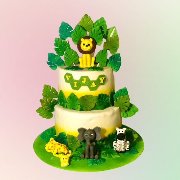 Awesome Forest Animals First Birthday Cake 4 Kg. Charming 4 Kg woodland-themed first birthday cake with fondant forest animals and trees.