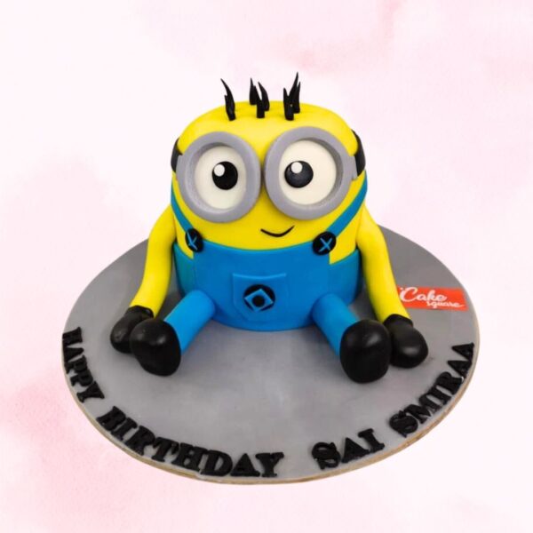 A fun Awesome Minion Kids Birthday Cake 2 kg, featuring the lovable yellow Minions in a playful design, perfect for young fans of these mischievous characters.