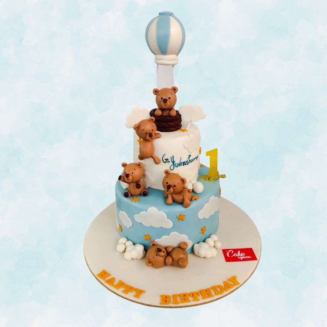 A Awesome Teddy Bear First Birthday Cake 3 kg, Featuring a cute teddy bear and pastel decorations, perfect for a baby’s first birthday celebration.