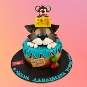 A Awesome Tom And Jerry Boys First Birthday Cake 6 kg, Featuring detailed Tom and Jerry designs and vibrant colors, perfect for a fun and playful first birthday celebration.