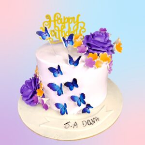 Beautiful Butterfly Girls Birthday Cake 1 Kg. Elegant 1 Kg girls' birthday cake with pastel-colored butterflies and floral decorations.