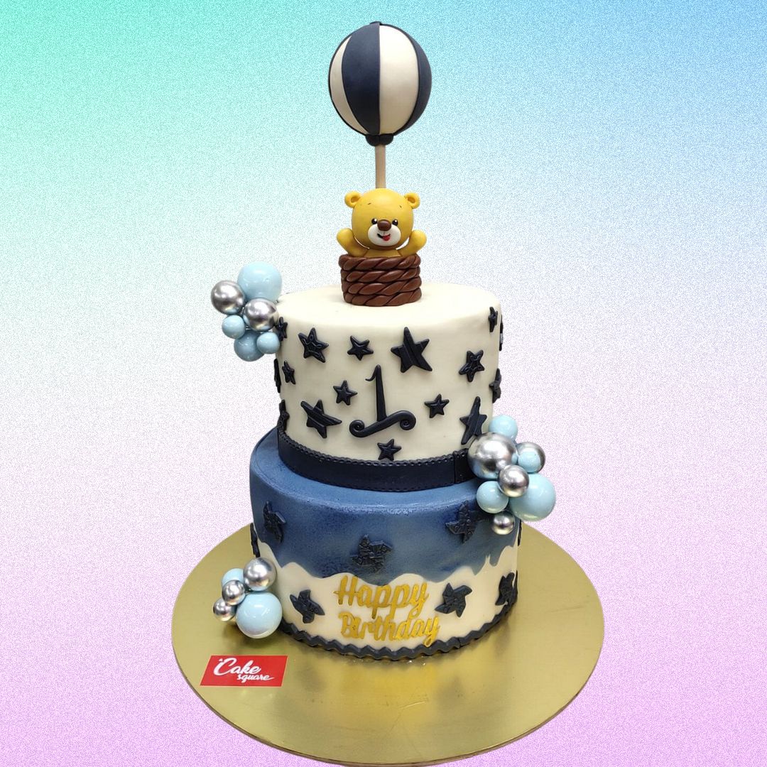 A Beautiful Teddy Boys First Birthday Cake 3 kg, Featuring an adorable teddy bear and charming decorations, perfect for a sweet and memorable first birthday.