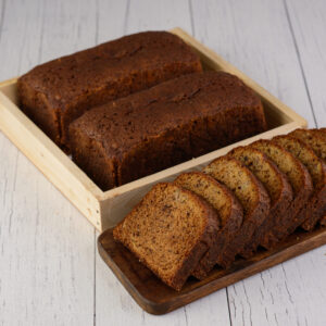 Best Banana Cake Slice 80 Grams. Moist banana cake slice, 80 grams, with visible banana bits.