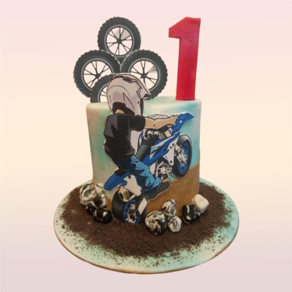 Best Bike Birthday Cake 1 Kg. A 1 kg cake sculpted to resemble a sleek motorcycle. Detailed fondant work captures chrome accents, rubber tires, and brand logo. "Happy Birthday" written on a fondant license plate. Edible tire tracks surround the base.