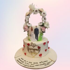 Best Engagement Cake 3 Kg adorned with elegant floral designs and intricate detailing, perfect for celebrating love and commitment.