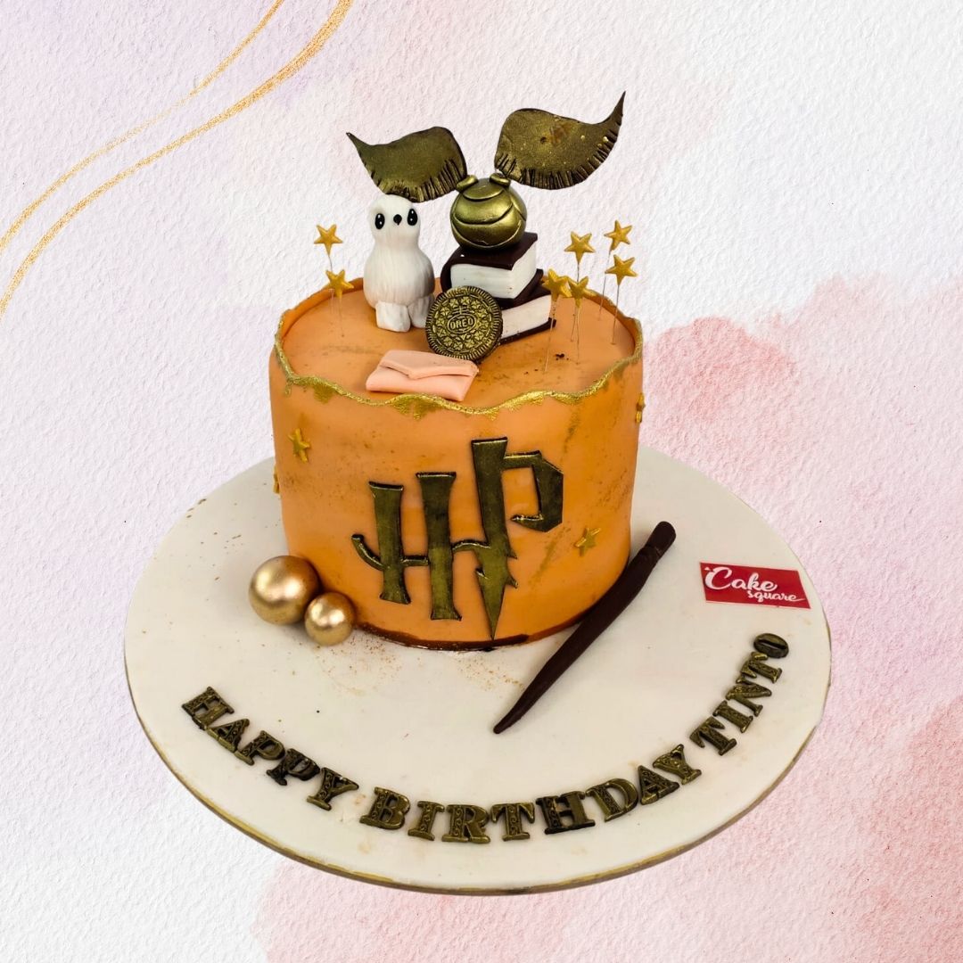 A magical Best Harry Potter Theme Birthday Cake 1 kg, featuring iconic elements like a wizard’s hat, glasses, and a golden snitch, perfect for young fans of the wizarding world.