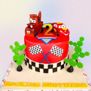 A sleek Best McQueen Car Birthday Cake 2 kg, featuring Lightning McQueen from the Cars movie, perfect for young racing fans.