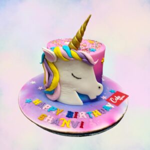 Best Unicorn Theme Girls Designer Birthday Cakes 1 Kg Single-tier pastel ombre cake with gold horn, floral mane, and sparkly eyes