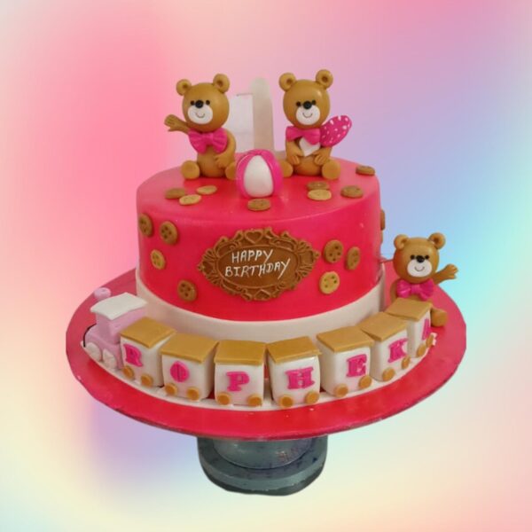 Blush Pink Teddy First Birthday Cake 2 Kg Two-tier blush pink cake with fondant teddy bear, bows, and "1" topper