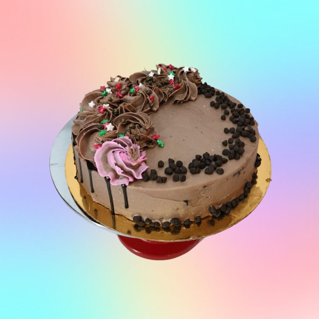 A delicious Chocolate swirl 1 Kg Birthday cake decorated with pipings of chocolate in circles for a special birthday touch.