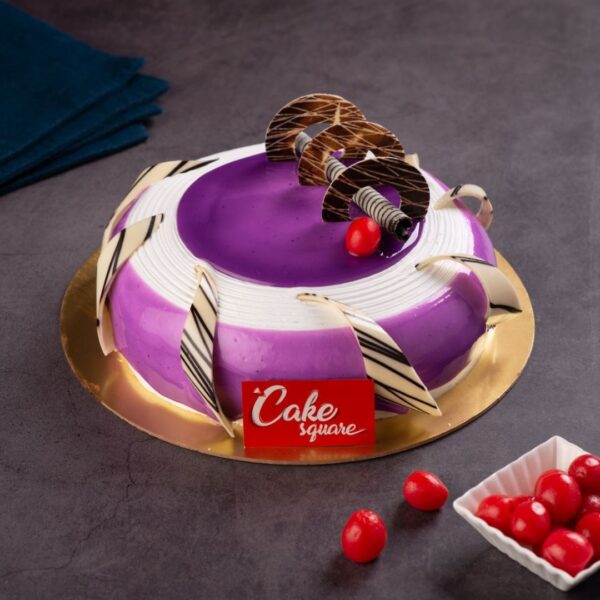 Classic black currant 1 kg Birthday cake with smooth purple frosting and decorative swirls made by Cake Square team.