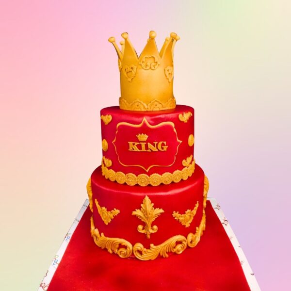 A majestic Cute King Crown First Birthday Cake for Kids 4 kg, featuring a gold crown and luxurious decorations, ideal for a kingly celebration for young boys.