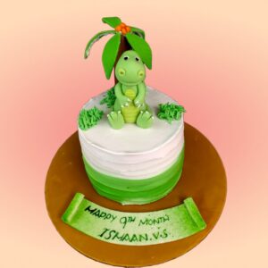 Daring Dinosaur Birthday Cake 1 Kg. Exciting 1 Kg dinosaur-themed birthday cake with 3D fondant dinosaurs and prehistoric decorations.