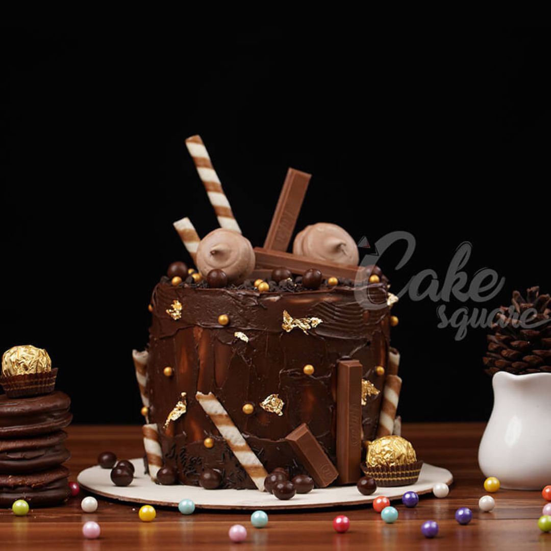 "Fancy Chocolate Cake 1 Kg Anniversary Cakes. fancy chocolate dripping cake perfect for anniversaries from Cake Square Chennai."