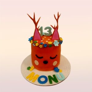 "Funny Reindeer Birthday Cake 1 Kg. Whimsical 1kg birthday cake featuring a cute cartoon reindeer design"