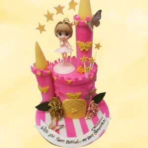 Best Gracious Pink Castle Birthday Cake 2 Kg Two-tier pink cake with castle turrets, windows, and glittery accents