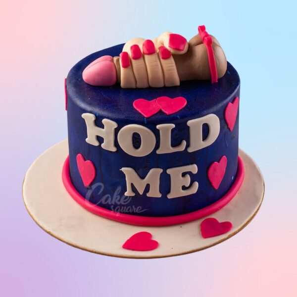 A Hold Me By Your Hand Bachelorette Party Cake, showcasing a whimsical and playful design, displayed on a festive table, ready to add a fun and memorable touch to the bachelorette celebration.