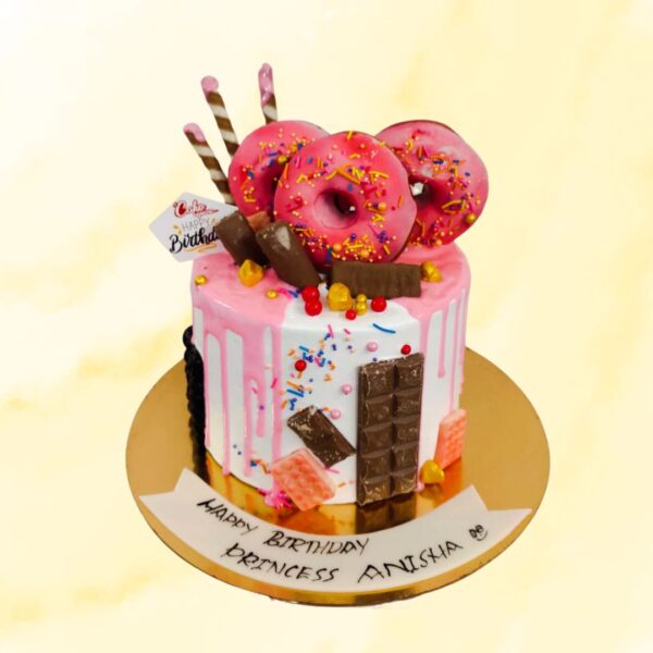 Hot Donut Birthday Cake 1 Kg. Tempting 1 Kg birthday cake designed as a giant, frosted donut with sprinkles.