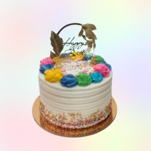 Layers of colours inside and finished with sprinkles in this Rainbow cake 1 Kg Birthday cake by Cake Square Chennai.