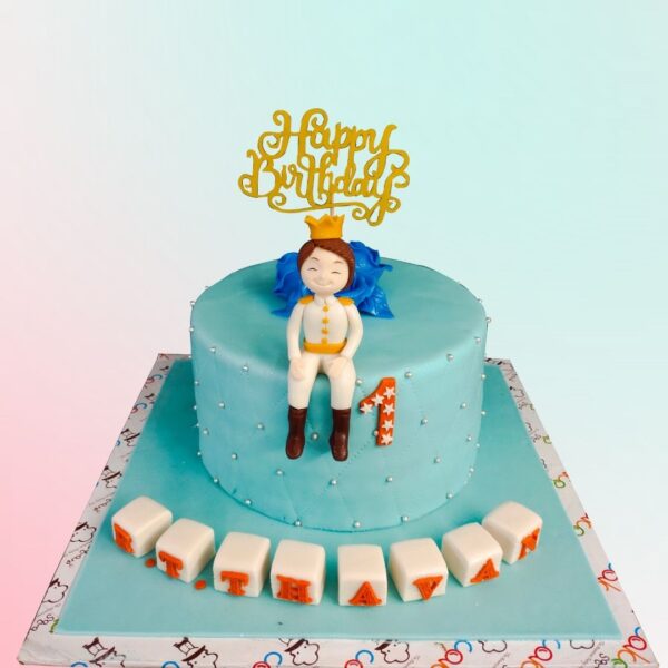 A charming Lovely Boy Theme Birthday Cake 1 kg, featuring cute decorations like hearts, stars, and playful colors, perfect for celebrating a special little boy.