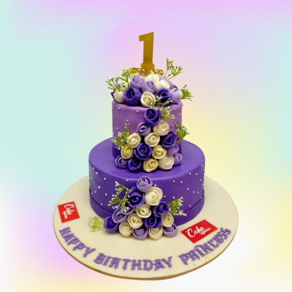 Luxury Purple Flowers Girls Birthday Cake 4 Kg Four-tier white cake with cascading purple flowers and gold leaf accents