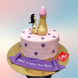 A playfully designed Make A Wish Blow Adult Cake featuring suggestive decorations and text, suitable for mature audiences and private celebrations.