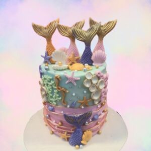 Mermaid Cake For Teenage Girls Birthday 2 Kg. Enchanting mermaid-themed birthday cake with ocean-blue frosting and shimmering scales.