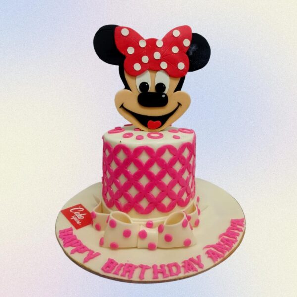 Minnie The Best Girls Fourth Birthday Cake 1 Kg. Cheerful Minnie Mouse-themed cake with red frosting and white polka dots for a 4-year-old girl.