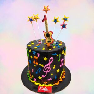 Rockin' Musical Guitar Theme Kids Birthday Cake 1 Kg with fondant fretboard, lifelike strings, and edible music notes, perfect for aspiring young musicians.