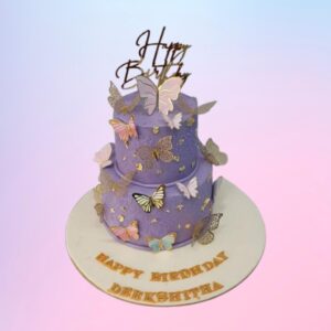 Best Rainbow Chocolate Girls Birthday Cake 2 Kg Two-tier cake with chocolate drip and rainbow-colored buttercream rosettes