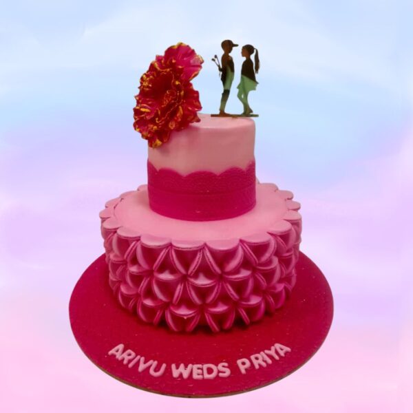 A small and perfect 3 Kg Pink cake with 3d decorations and a proposal cake topper with 1 big Handmade fondant flower is our Pink Bride to be Engagement cakes 3 Kg. Made by Cake Square team.