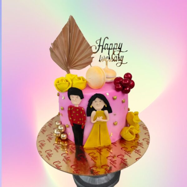 A pink cake with yellow flowers and a cute couple made in fondant is our Pink Couple 1 Kg Anniversary Cake by Cake Square Chennai