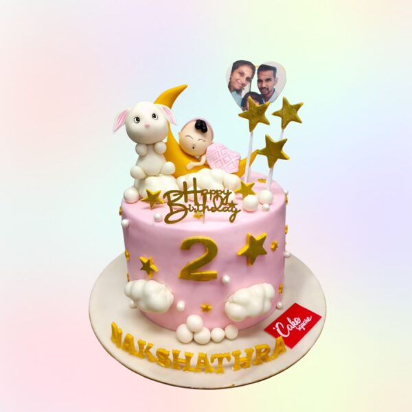 Pinky Stars Baby Second Birthday Cake 2 Kg with glittery accents and celestial designs.