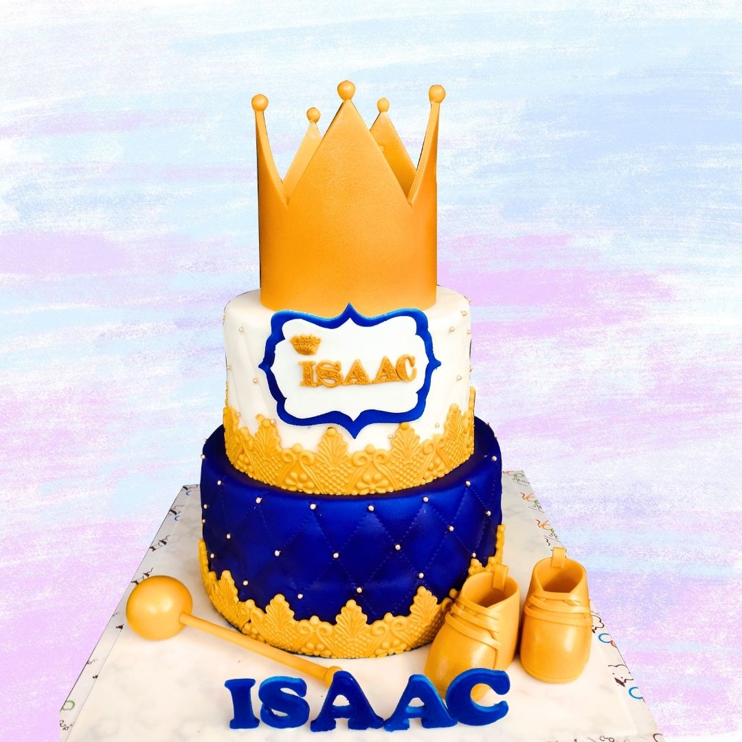 A regal 4 kg Prince Crown-themed first birthday cake, featuring a golden crown topper and royal blue decorations, perfect for a baby boy’s milestone celebration.