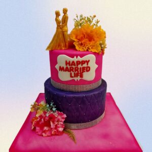 A two tier 4 kg cake made in purple and pink to match the bridal costume with loveley flowers to make it more elegant is our Purple Wedding Engagement Cake 4 Kg. Made by Cake Square Team.