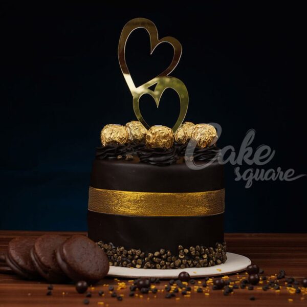 "Rich Ferrero Rocher Chocolate Cakes 1 Kg Birthday Cakes. Ferrero Rocher chocolate dripping cake, perfect for birthdays from Cake Square Chennai."