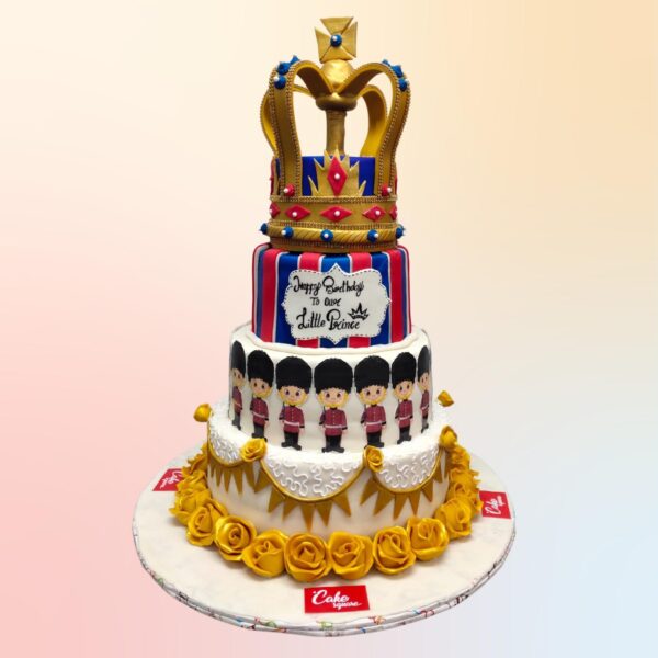 Royal Prince 5 Tier First Birthday Cake - grand multi-tiered cake with gold crown topper and regal blue and gold decorations