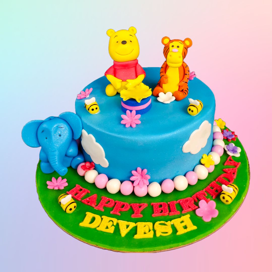 Smiling Winnie the Pooh Customised Birthday Cake 2 Kg, perfect for a joyful celebration.