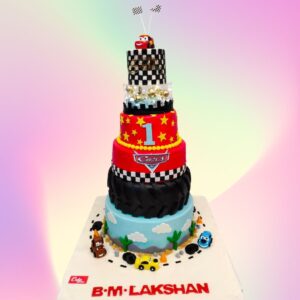 Tall and big car theme boys first birthday cake 5 tier,Impressive 5-tier cake decorated with colorful fondant cars, road signs, and racing elements, crowned with a "1" topper for a car-loving boy's first birthday.