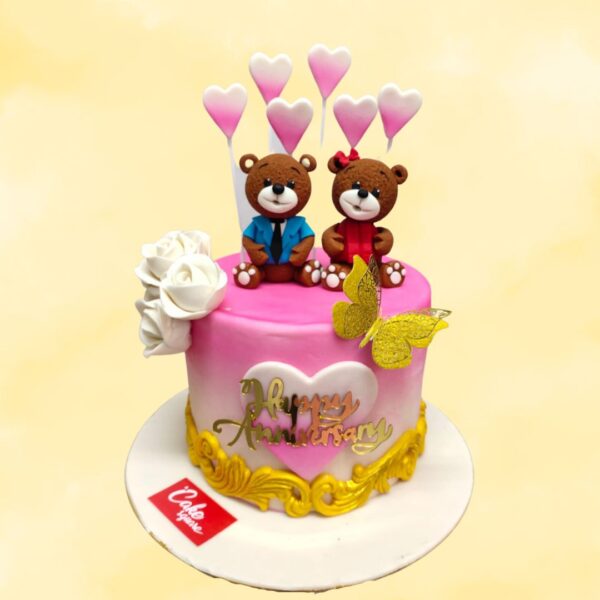 A pair of teddys on top of a beautiful cake is just right for this special anniversary day celebration. Order now