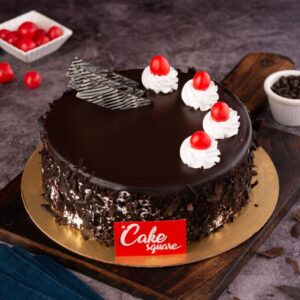Our Truffle Black Forest 1 kg birthday Cake is a delicious cake topped with cherries on a chocolaty base.
