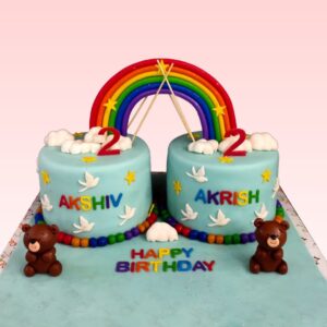 Twinkling Twins Rainbow Birthday Cake 2 Kg, a vibrant cake for a double celebration.